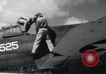 Image of Pilot and plane captain of F4U perform engine start Espiritu Santo New Hebrides Islands, 1944, second 17 stock footage video 65675034616