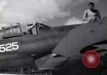 Image of Pilot and plane captain of F4U perform engine start Espiritu Santo New Hebrides Islands, 1944, second 22 stock footage video 65675034616