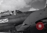 Image of Pilot and plane captain of F4U perform engine start Espiritu Santo New Hebrides Islands, 1944, second 23 stock footage video 65675034616