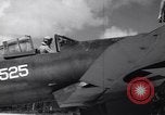 Image of Pilot and plane captain of F4U perform engine start Espiritu Santo New Hebrides Islands, 1944, second 24 stock footage video 65675034616