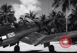 Image of Pilot and plane captain of F4U perform engine start Espiritu Santo New Hebrides Islands, 1944, second 26 stock footage video 65675034616