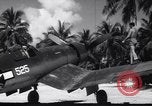 Image of Pilot and plane captain of F4U perform engine start Espiritu Santo New Hebrides Islands, 1944, second 29 stock footage video 65675034616