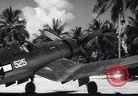 Image of Pilot and plane captain of F4U perform engine start Espiritu Santo New Hebrides Islands, 1944, second 32 stock footage video 65675034616
