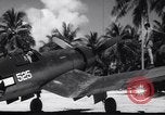 Image of Pilot and plane captain of F4U perform engine start Espiritu Santo New Hebrides Islands, 1944, second 33 stock footage video 65675034616