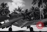 Image of Pilot and plane captain of F4U perform engine start Espiritu Santo New Hebrides Islands, 1944, second 37 stock footage video 65675034616