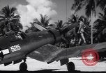 Image of Pilot and plane captain of F4U perform engine start Espiritu Santo New Hebrides Islands, 1944, second 41 stock footage video 65675034616