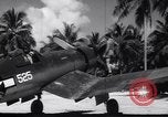 Image of Pilot and plane captain of F4U perform engine start Espiritu Santo New Hebrides Islands, 1944, second 42 stock footage video 65675034616