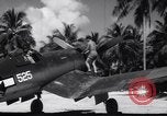 Image of Pilot and plane captain of F4U perform engine start Espiritu Santo New Hebrides Islands, 1944, second 43 stock footage video 65675034616