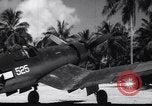 Image of Pilot and plane captain of F4U perform engine start Espiritu Santo New Hebrides Islands, 1944, second 45 stock footage video 65675034616