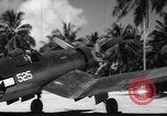 Image of Pilot and plane captain of F4U perform engine start Espiritu Santo New Hebrides Islands, 1944, second 47 stock footage video 65675034616
