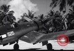 Image of Pilot and plane captain of F4U perform engine start Espiritu Santo New Hebrides Islands, 1944, second 52 stock footage video 65675034616