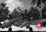 Image of Pilot and plane captain of F4U perform engine start Espiritu Santo New Hebrides Islands, 1944, second 57 stock footage video 65675034616