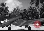 Image of Pilot and plane captain of F4U perform engine start Espiritu Santo New Hebrides Islands, 1944, second 58 stock footage video 65675034616
