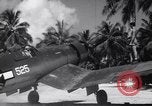 Image of Pilot and plane captain of F4U perform engine start Espiritu Santo New Hebrides Islands, 1944, second 60 stock footage video 65675034616