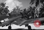 Image of Pilot and plane captain of F4U perform engine start Espiritu Santo New Hebrides Islands, 1944, second 62 stock footage video 65675034616