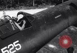 Image of Marine Aircraft Group 11 F4U Corsairs arrive back from mission Espiritu Santo New Hebrides Islands, 1944, second 4 stock footage video 65675034617