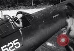 Image of Marine Aircraft Group 11 F4U Corsairs arrive back from mission Espiritu Santo New Hebrides Islands, 1944, second 5 stock footage video 65675034617