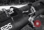 Image of Marine Aircraft Group 11 F4U Corsairs arrive back from mission Espiritu Santo New Hebrides Islands, 1944, second 6 stock footage video 65675034617