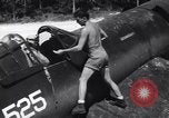 Image of Marine Aircraft Group 11 F4U Corsairs arrive back from mission Espiritu Santo New Hebrides Islands, 1944, second 7 stock footage video 65675034617