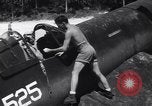 Image of Marine Aircraft Group 11 F4U Corsairs arrive back from mission Espiritu Santo New Hebrides Islands, 1944, second 8 stock footage video 65675034617