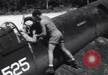 Image of Marine Aircraft Group 11 F4U Corsairs arrive back from mission Espiritu Santo New Hebrides Islands, 1944, second 10 stock footage video 65675034617