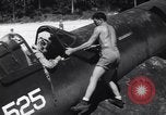 Image of Marine Aircraft Group 11 F4U Corsairs arrive back from mission Espiritu Santo New Hebrides Islands, 1944, second 12 stock footage video 65675034617