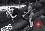 Image of Marine Aircraft Group 11 F4U Corsairs arrive back from mission Espiritu Santo New Hebrides Islands, 1944, second 13 stock footage video 65675034617