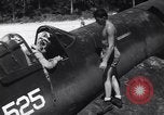 Image of Marine Aircraft Group 11 F4U Corsairs arrive back from mission Espiritu Santo New Hebrides Islands, 1944, second 14 stock footage video 65675034617