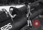 Image of Marine Aircraft Group 11 F4U Corsairs arrive back from mission Espiritu Santo New Hebrides Islands, 1944, second 15 stock footage video 65675034617