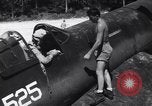 Image of Marine Aircraft Group 11 F4U Corsairs arrive back from mission Espiritu Santo New Hebrides Islands, 1944, second 16 stock footage video 65675034617