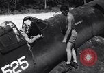 Image of Marine Aircraft Group 11 F4U Corsairs arrive back from mission Espiritu Santo New Hebrides Islands, 1944, second 18 stock footage video 65675034617