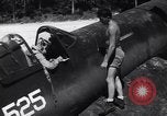 Image of Marine Aircraft Group 11 F4U Corsairs arrive back from mission Espiritu Santo New Hebrides Islands, 1944, second 20 stock footage video 65675034617