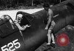 Image of Marine Aircraft Group 11 F4U Corsairs arrive back from mission Espiritu Santo New Hebrides Islands, 1944, second 21 stock footage video 65675034617