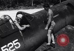 Image of Marine Aircraft Group 11 F4U Corsairs arrive back from mission Espiritu Santo New Hebrides Islands, 1944, second 22 stock footage video 65675034617