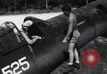 Image of Marine Aircraft Group 11 F4U Corsairs arrive back from mission Espiritu Santo New Hebrides Islands, 1944, second 23 stock footage video 65675034617