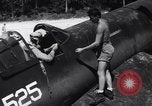 Image of Marine Aircraft Group 11 F4U Corsairs arrive back from mission Espiritu Santo New Hebrides Islands, 1944, second 24 stock footage video 65675034617