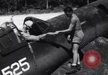 Image of Marine Aircraft Group 11 F4U Corsairs arrive back from mission Espiritu Santo New Hebrides Islands, 1944, second 25 stock footage video 65675034617