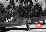 Image of Marine Aircraft Group 11 F4U Corsairs arrive back from mission Espiritu Santo New Hebrides Islands, 1944, second 34 stock footage video 65675034617