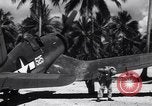 Image of Marine Aircraft Group 11 F4U Corsairs arrive back from mission Espiritu Santo New Hebrides Islands, 1944, second 45 stock footage video 65675034617