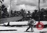 Image of Marine Aircraft Group 11 F4U Corsairs arrive back from mission Espiritu Santo New Hebrides Islands, 1944, second 51 stock footage video 65675034617