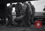 Image of B-26 bomber aircraft being armed Tunisia North Africa, 1943, second 35 stock footage video 65675034693