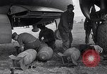 Image of B-26 bomber aircraft being armed Tunisia North Africa, 1943, second 49 stock footage video 65675034693