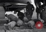 Image of B-26 bomber aircraft being armed Tunisia North Africa, 1943, second 50 stock footage video 65675034693