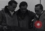 Immagine di I piloti della 334 Fighter Squadron tenere il punteggio di vittorie Il Debden Inghilterra, 1945, secondo 12 filmato di repertorio 65675034698