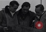 Immagine di I piloti della 334 Fighter Squadron tenere il punteggio di vittorie Il Debden Inghilterra, 1945, secondo 13 filmato di repertorio 65675034698