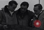 Immagine di I piloti della 334 Fighter Squadron tenere il punteggio di vittorie Il Debden Inghilterra, 1945, secondo 15 filmato di repertorio 65675034698