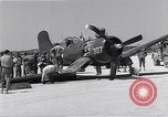 Image of Navy F-4U Corsair gear collapses during landing Okinawa Ryukyu Islands, 1945, second 38 stock footage video 65675034705