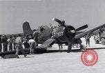 Image of Navy F-4U Corsair gear collapses during landing Okinawa Ryukyu Islands, 1945, second 40 stock footage video 65675034705