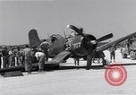 Image of Navy F-4U Corsair gear collapses during landing Okinawa Ryukyu Islands, 1945, second 41 stock footage video 65675034705