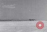 Image of P-38 aircraft of the 318th Fighter Group landing Okinawa Ryukyu Islands, 1945, second 7 stock footage video 65675034706